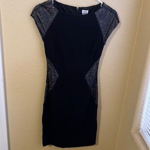 Black dress with leather cut outs